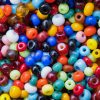macro of a lot of colored plastic beads as picture background